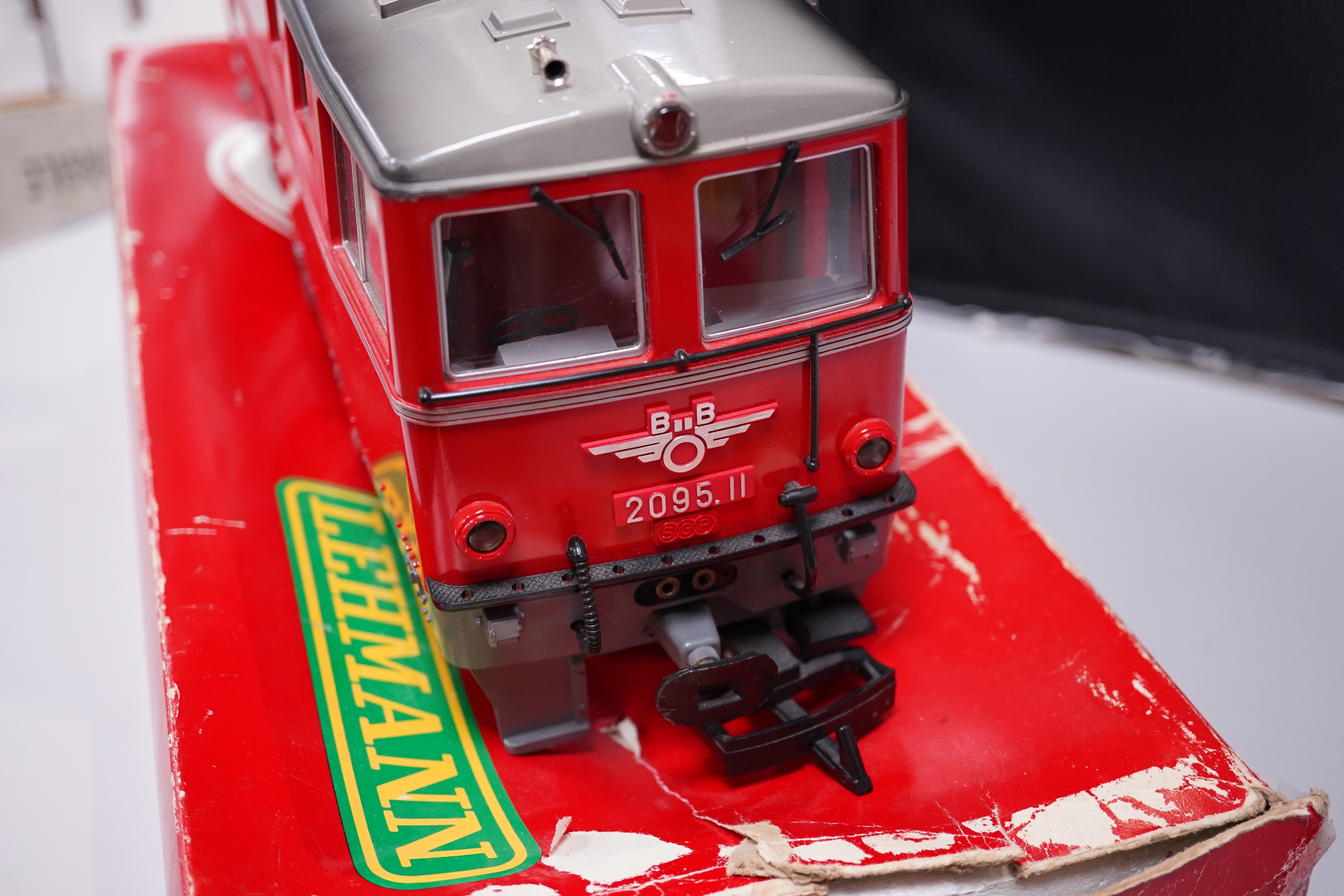 A boxed Lehmann LGB G scale railway OBB Austrian outline Bo-Bo diesel locomotive, 2095.11. Condition - fair, some wear and minor damage, and damage to the box.